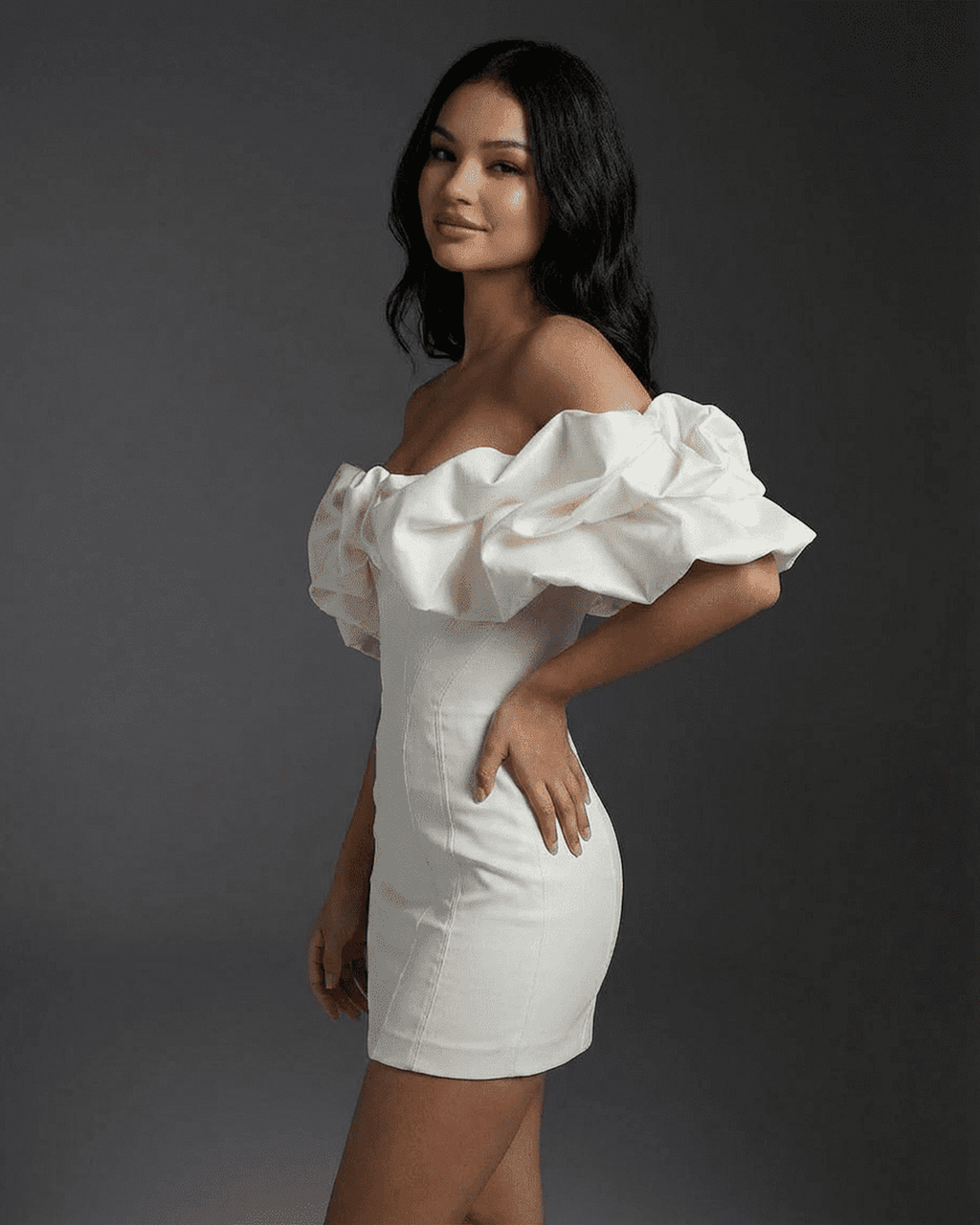 Celeste Mini Dress by Lauven featuring boned structure and ruffle trim in a bodycon silhouette.