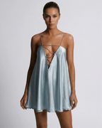 Celeste Mini Dress by Lauven in soft sky blue satin with rhinestone detailing and A-line cut.