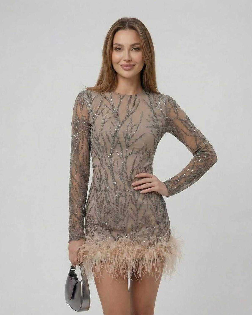 Lauven Celeste Mini Dress featuring sequin embellishments and feather trim, perfect for a luxurious look.