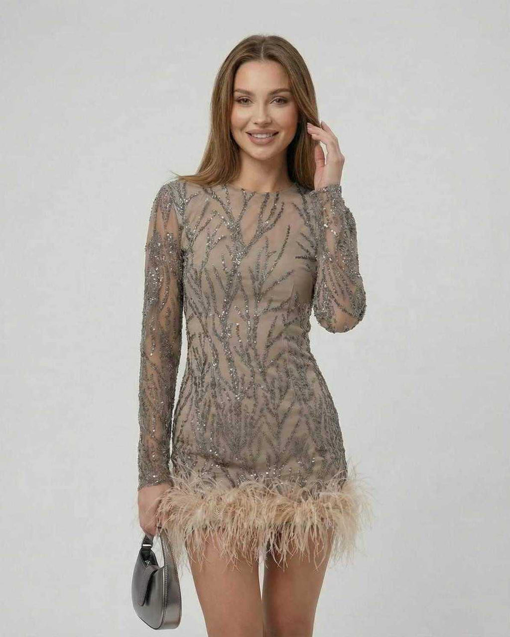 Lauven Celeste Mini Dress with sequin embellishments and feather trim in taupe, showcasing luxury fashion.