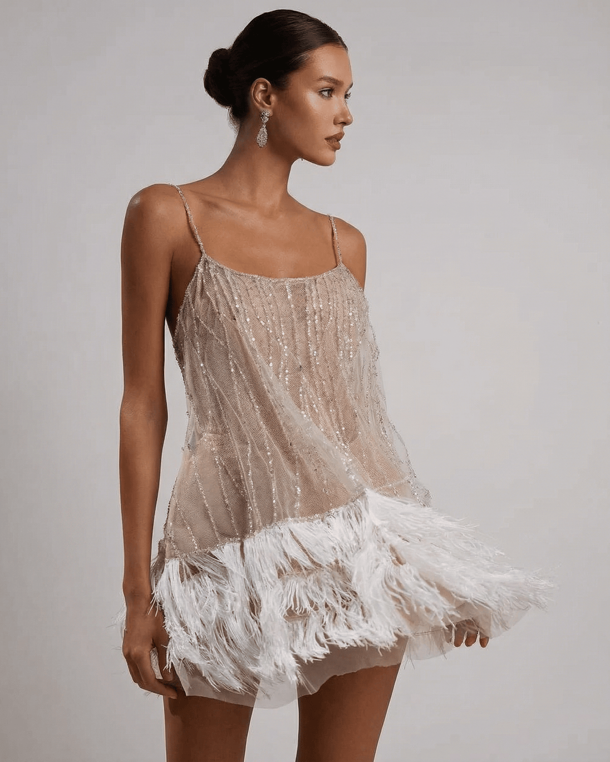 Celeste Mini Dress by Lauven - Sequin Tulle Fairycore Mini Dress with Feather Tassel Hem.