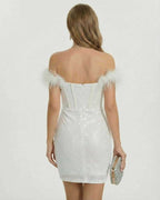 Back view of Lauven Celeste Mini Dress featuring off-shoulder design and feathered trim in white.