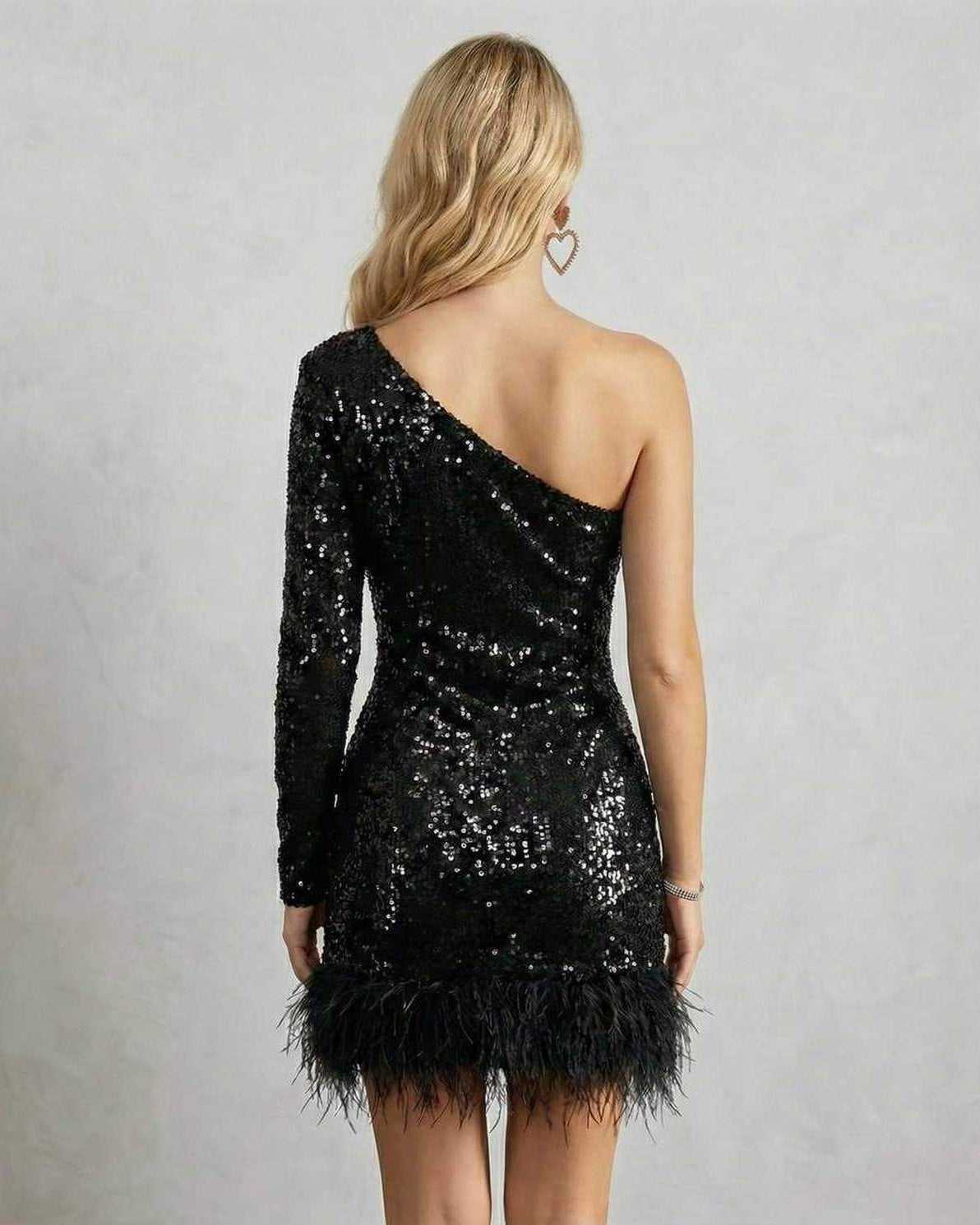 Celeste Mini Dress by Lauven, a one-shoulder black sequined dress with feather trim, perfect for evening glamour.