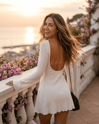 Celeste Mini Dress by Lauven, a sexy fitted V-neck open back mini dress with elegant design.