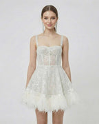 Celeste Mini Dress by Lauven - Silver Sequin A-Line Mini Dress with Faux Fur Hem, stylish and modern.