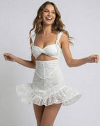 Celeste Mini Dress by Lauven in White Lace with Spaghetti Straps and Slim Fit, featuring a flared hem for a stylish look.
