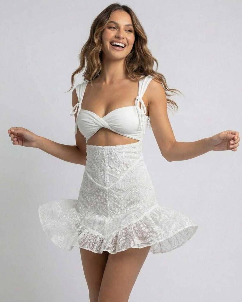 Celeste Mini Dress by Lauven in White Lace with Spaghetti Straps and Slim Fit, featuring a flared hem for a stylish look.