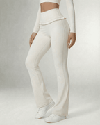 Celeste Leggings by Lauven, elegant white flare pants with pockets and ruffle detail.