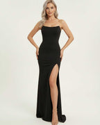 Celestia Maxi Dress by Lauven – Elegant black maxi dress with corset bodice and high slit silhouette.
