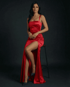 Celestia Maxi Dress by Lauven in red satin with thigh-high split and square neckline, perfect for elegant parties.