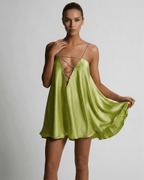 Chartreuse Mini Dress by Lauven, featuring a sleek A-line silhouette and V-neckline in a luxurious silky fabric.