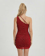 Back view of the Lauven Crimson Mini Dress featuring asymmetrical one-shoulder design and subtle sequin detailing.