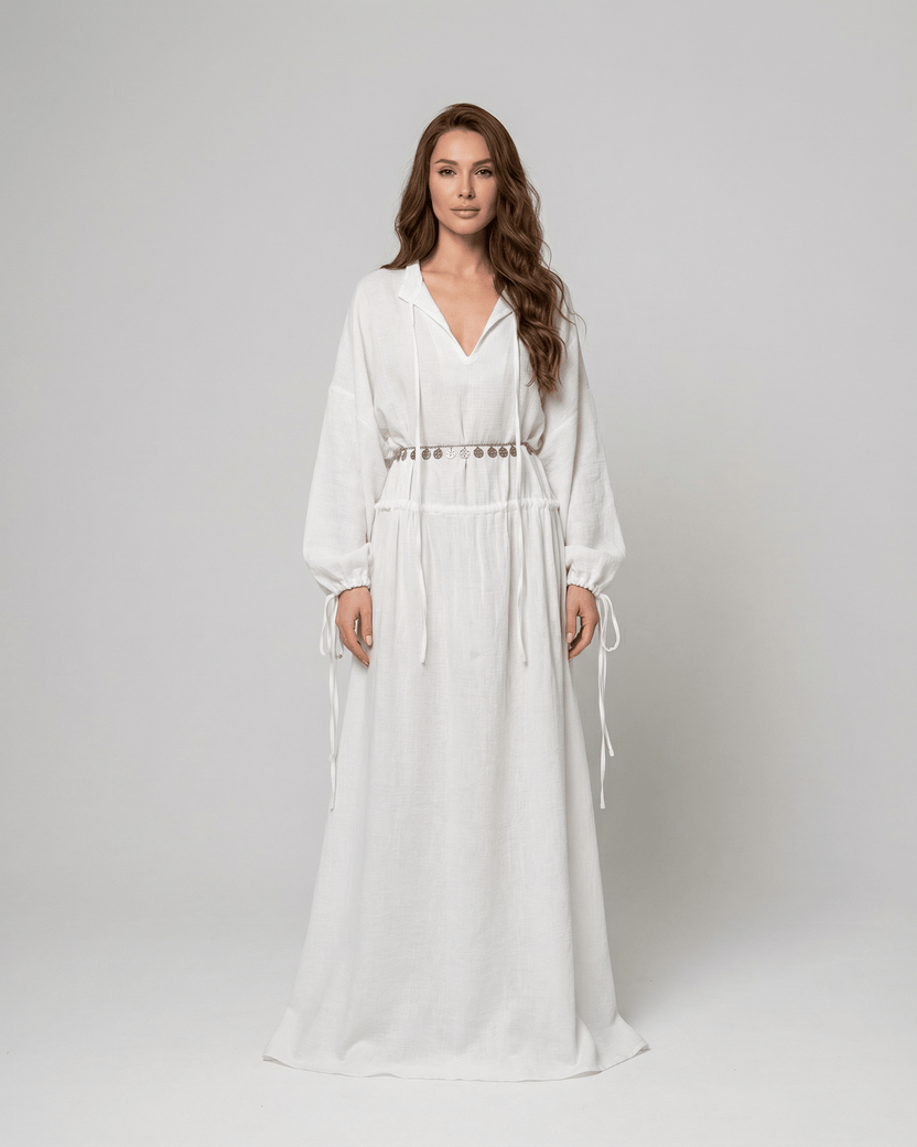 Elara Maxi Dress by Lauven, a cotton A-Line maxi dress with adjustable waist and long sleeves in white.