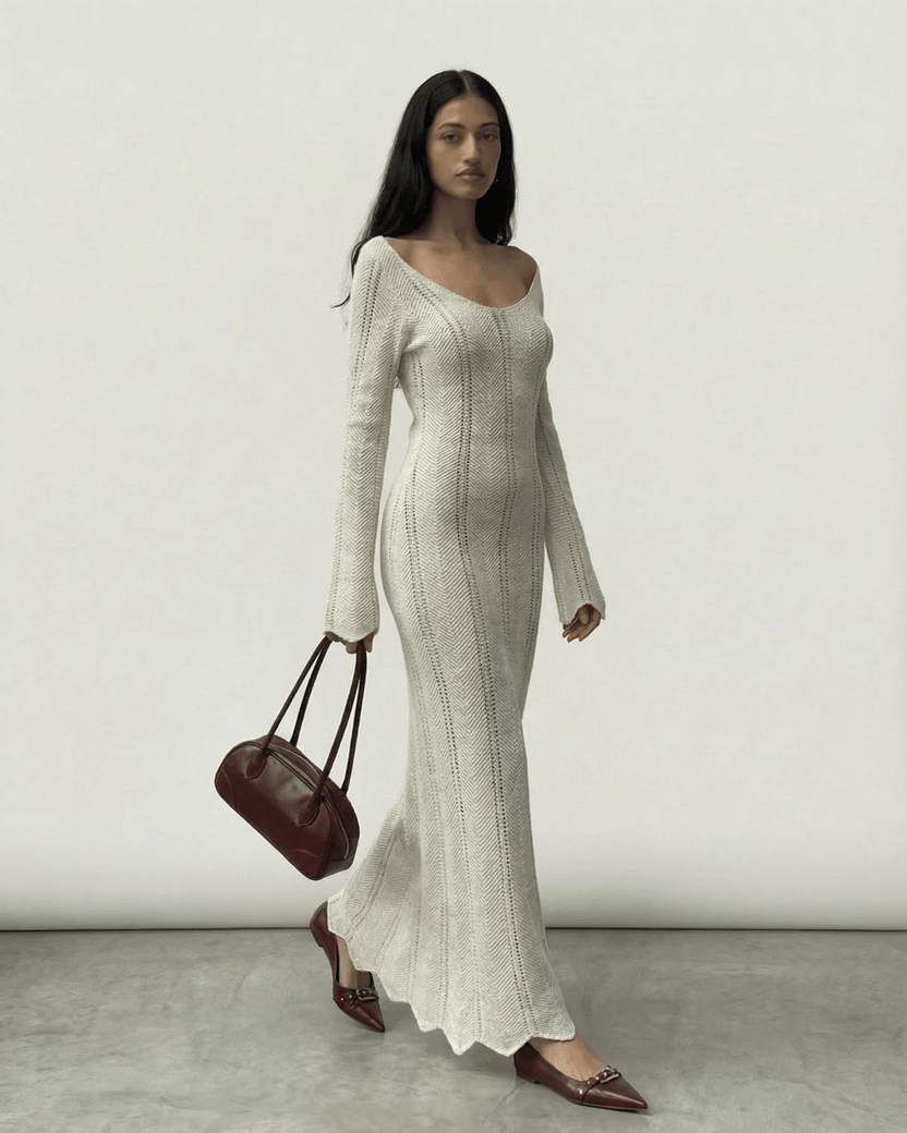 Model wearing Elara Maxi Dress by Lauven, featuring a ribbed design and flowing silhouette.