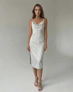 Elara Midi Dress by Lauven, elegant satin-effect spaghetti strap split midi dress showcased on model.