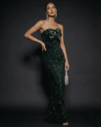 Emerald Maxi Dress by Lauven, featuring a strapless design with a satin bow and sequin embellishments.