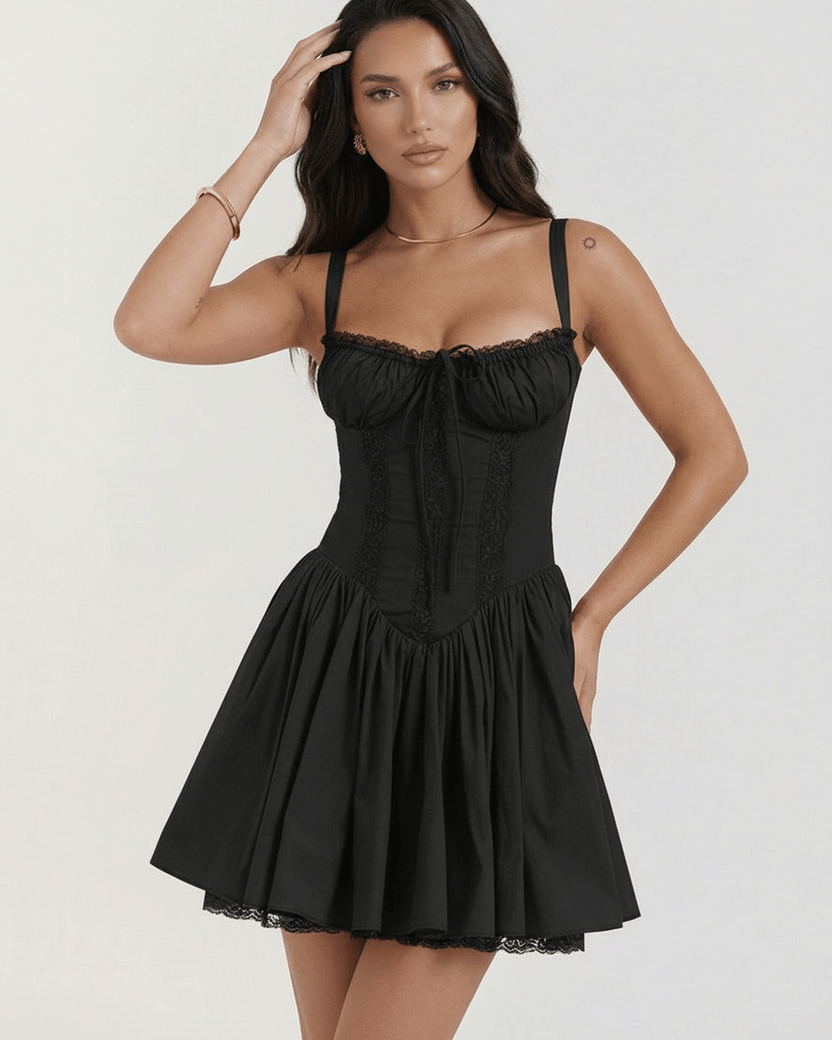 Aurora Mini Dress by Lauven, showcasing a flirty black strapless lace design with adjustable spaghetti straps.