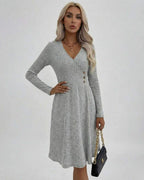 Florence Midi Dress by Lauven – Women’s grey midi dress with long sleeves and V-neck detail, showcasing elegance.