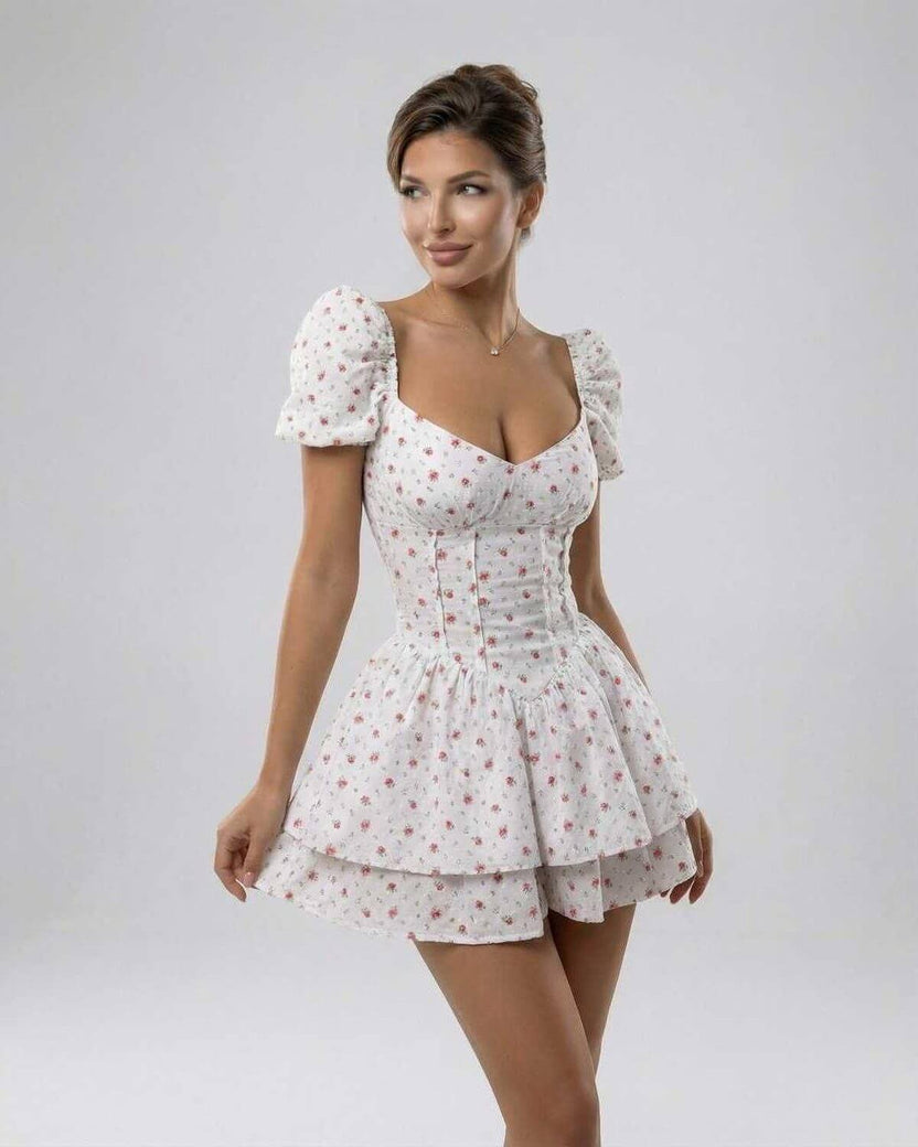 Florence Mini Dress by Lauven featuring floral print, puff sleeves, and V-neckline in an elegant A-line silhouette.