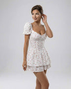 Florence Mini Dress by Lauven, floral print A-line mini dress with puff sleeves and V-neck detail.