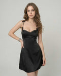 Florence Mini Dress by Lauven - Satin slip dress with ruffle trim and spaghetti straps, showcasing a sleek silhouette.