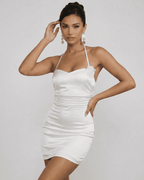 Floria Mini Dress by Lauven, floral halter neckline, white high-waist silhouette for women, sleeveless design.