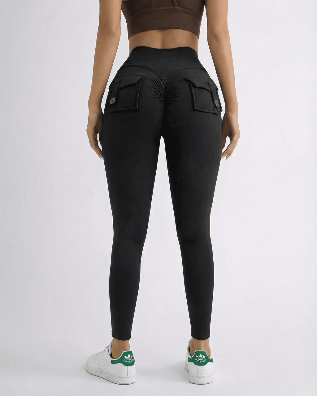 Iris Leggings Black from Lauven - Sleek ankle-length leggings with pockets, high waistband, and seamless silhouette.