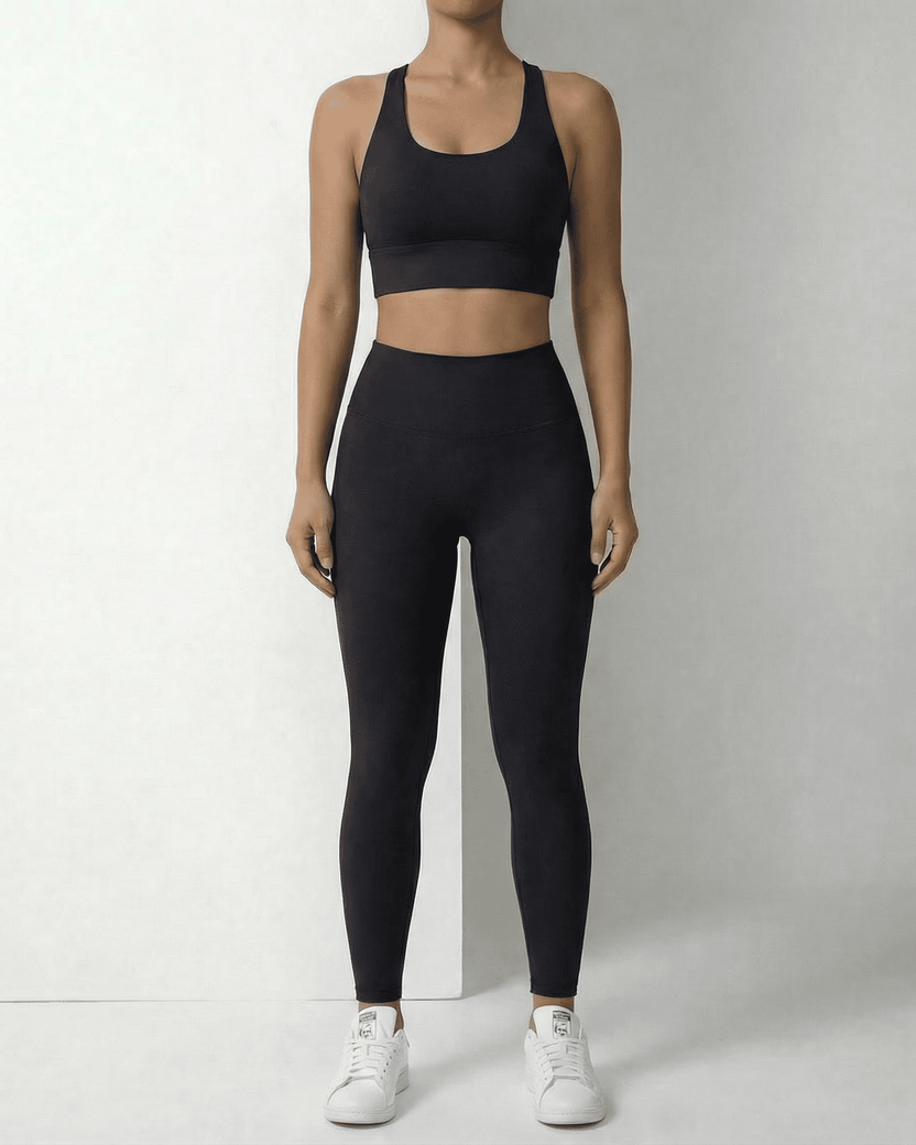 Iris Leggings Black by Lauven - Sleek black ankle-length leggings with pockets, designed for comfort and style.