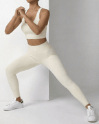 Iris Leggings Cream by Lauven, stylish ankle-length leggings showcasing a smooth fit and functional pockets.