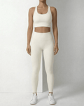 Iris Leggings Cream by Lauven, sleek ankle-length leggings with pockets, featuring a high waistband and a smooth fit.