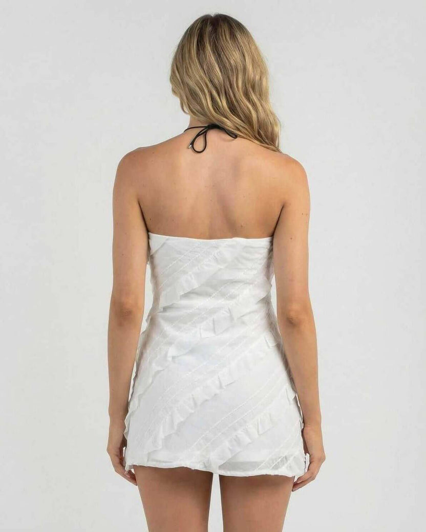 Isla Mini Dress by Lauven, elegant strapless sheath dress with delicate ruffle details, back view.