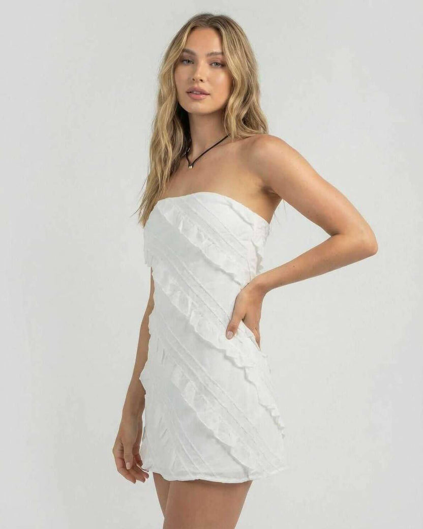 Isla Mini Dress by Lauven, featuring a strapless style with delicate ruffle details in white, perfect for modern elegance.