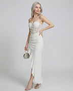 Isolde Maxi Dress by Lauven, asymmetrical white dress with lace corset bodice and high-low hem.