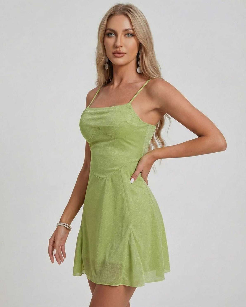 Ivy Mini Dress by Lauven featuring a shimmering A-line silhouette in a vibrant green color.