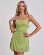 Ivy Mini Dress by Lauven in shimmering light green fabric with A-line silhouette and square neckline.