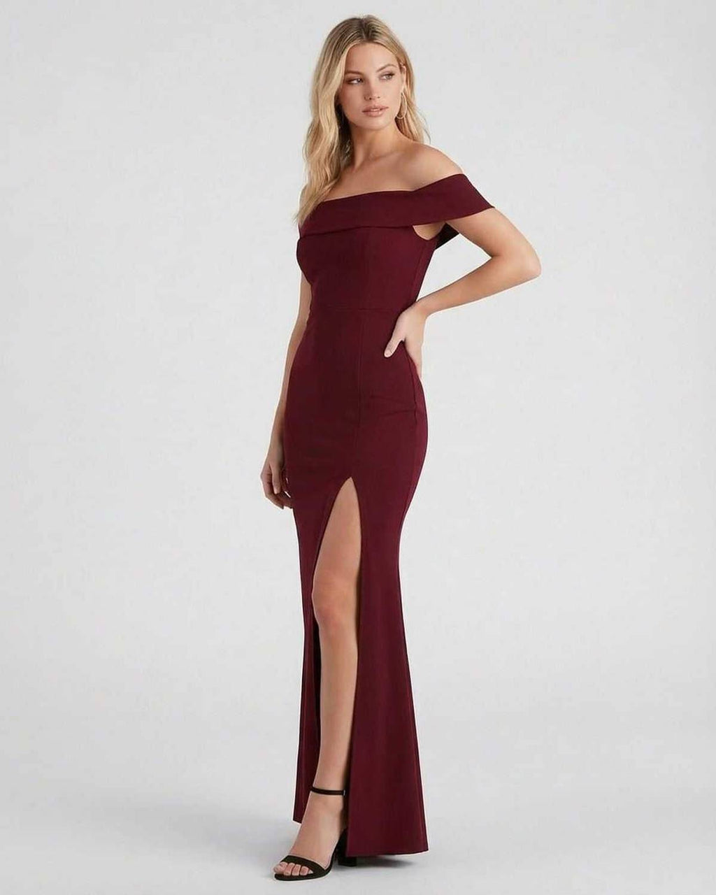 Kaia Maxi Dress by Lauven in burgundy, featuring an elegant off-the-shoulder design and a sleek thigh-high slit.