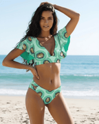Lauven Kiwi Two-Piece Swimsuit featuring vibrant kiwi print, deep V-neckline, and flutter sleeves for stylish beachwear.