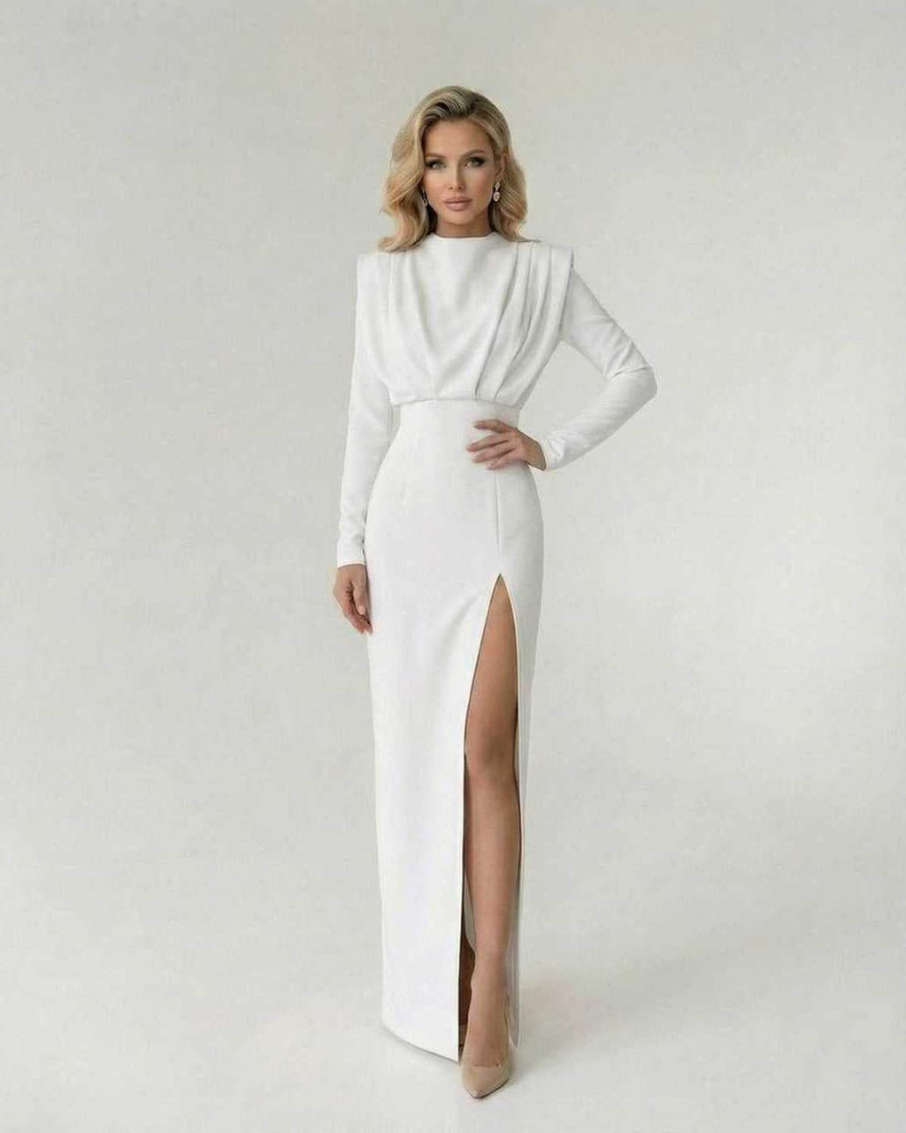 Liora Maxi Dress by Lauven, featuring an elegant fit and flare with a high side slit in pristine white.