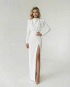 Liora Maxi Dress by Lauven, featuring an elegant fit and flare with a high side slit in pristine white.
