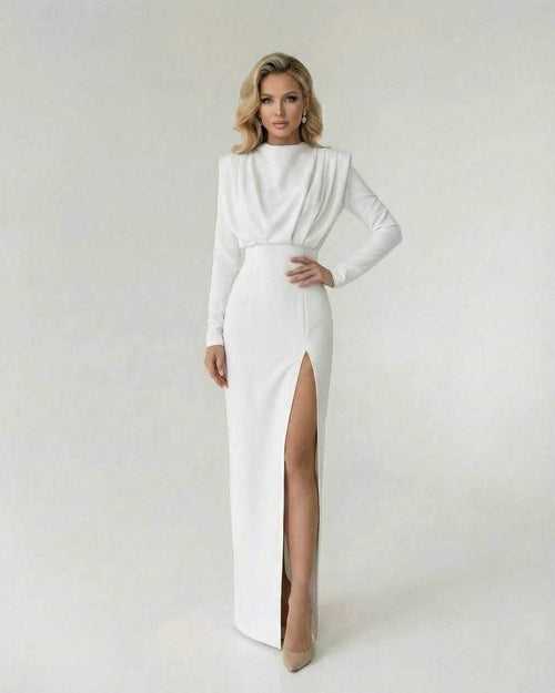 Liora Maxi Dress by Lauven, featuring an elegant fit and flare with a high side slit in pristine white.