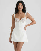 Louvre Mini Dress by Lauven - White satin mini dress with lace bust detail and A-line silhouette.