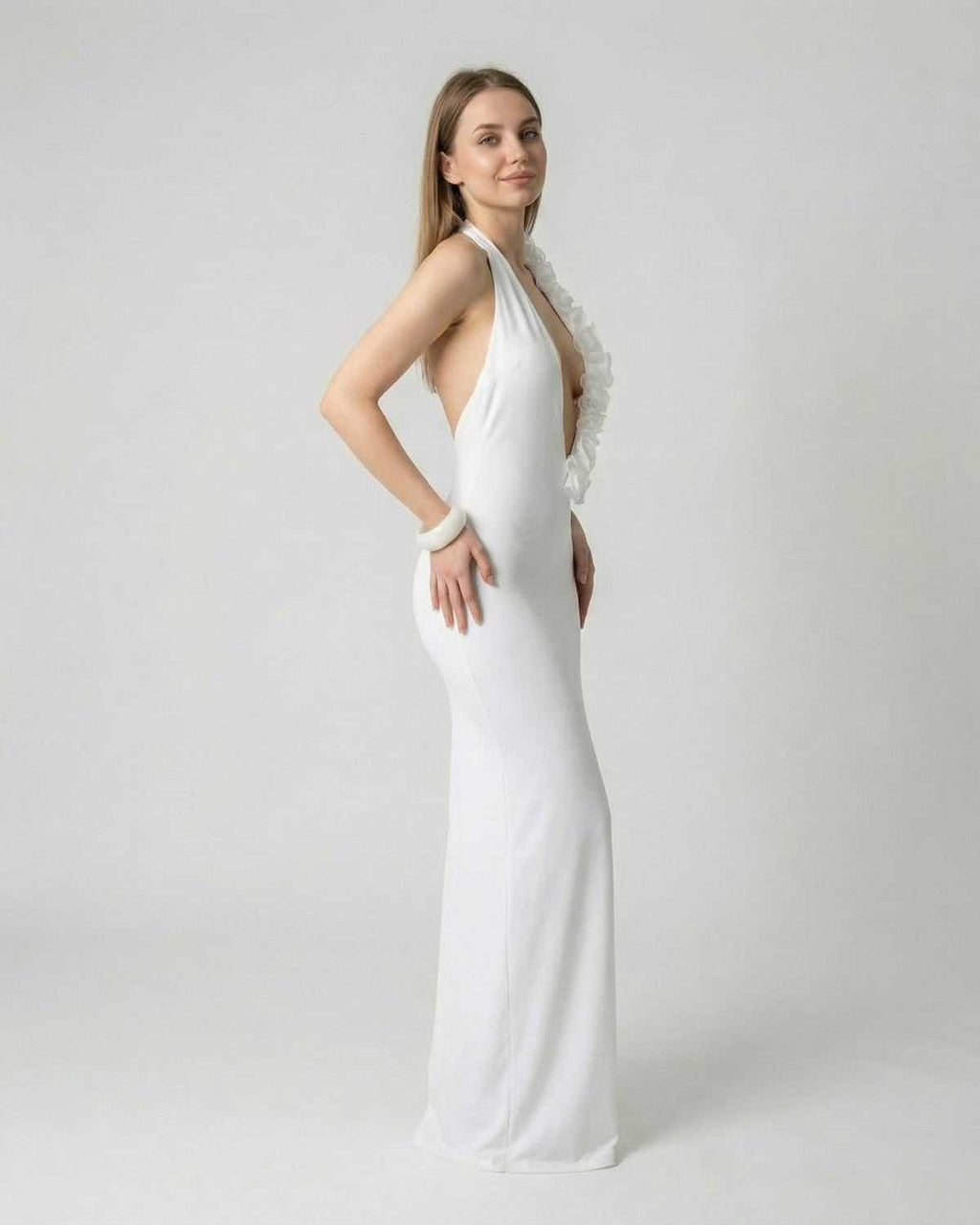 Lumière Maxi Dress by Lauven, white deep V neck backless design with 3D floral detail, showcasing a sleek silhouette.