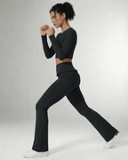 Luna Leggings by Lauven in sleek black, featuring a high-waist design and practical pockets for active wear.