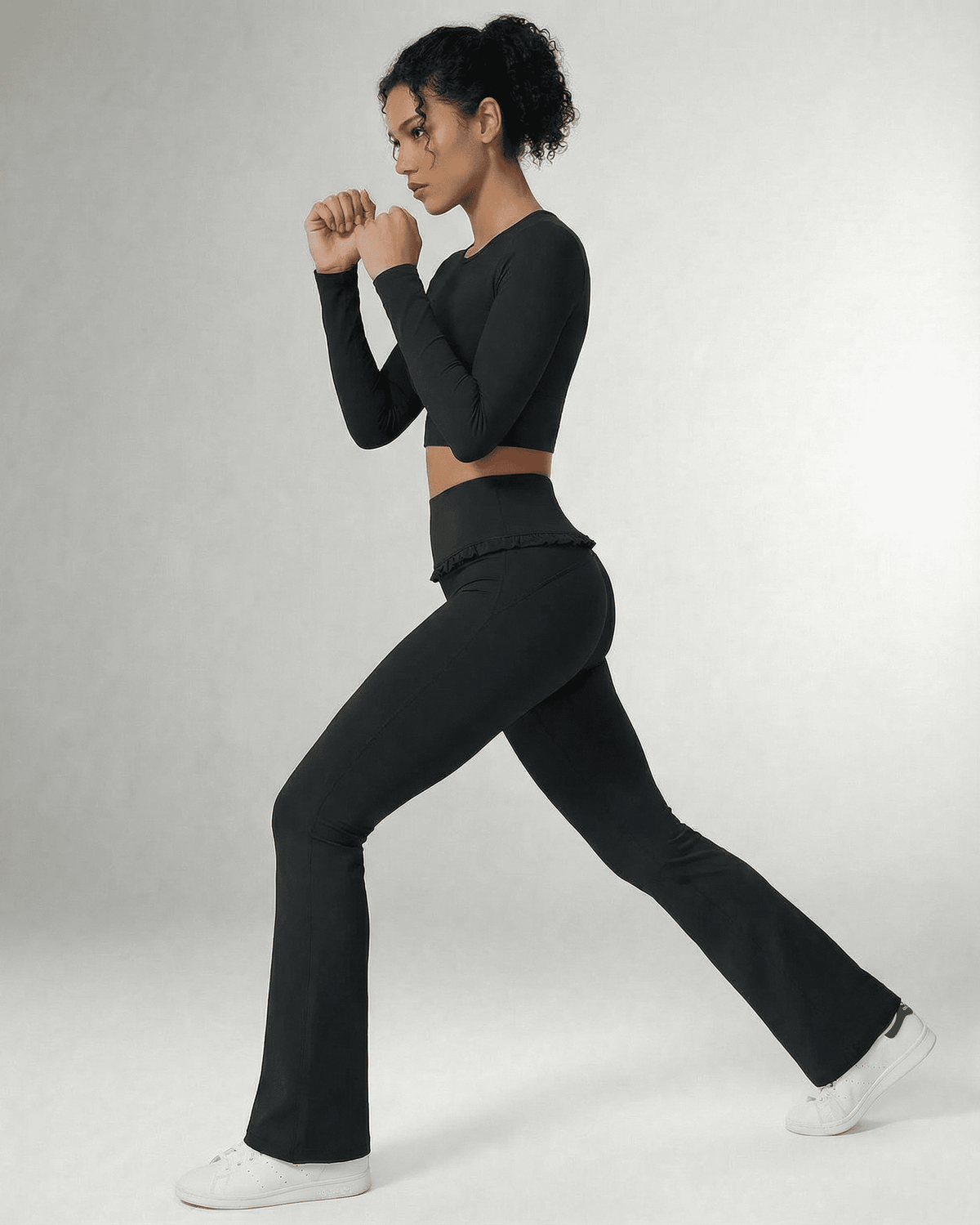 Luna Leggings by Lauven in sleek black, featuring a high-waist design and practical pockets for active wear.