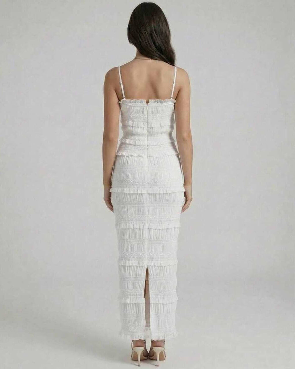 Luna Maxi Dress by Lauven, showcasing a sleek sheath silhouette in crisp white from the back.