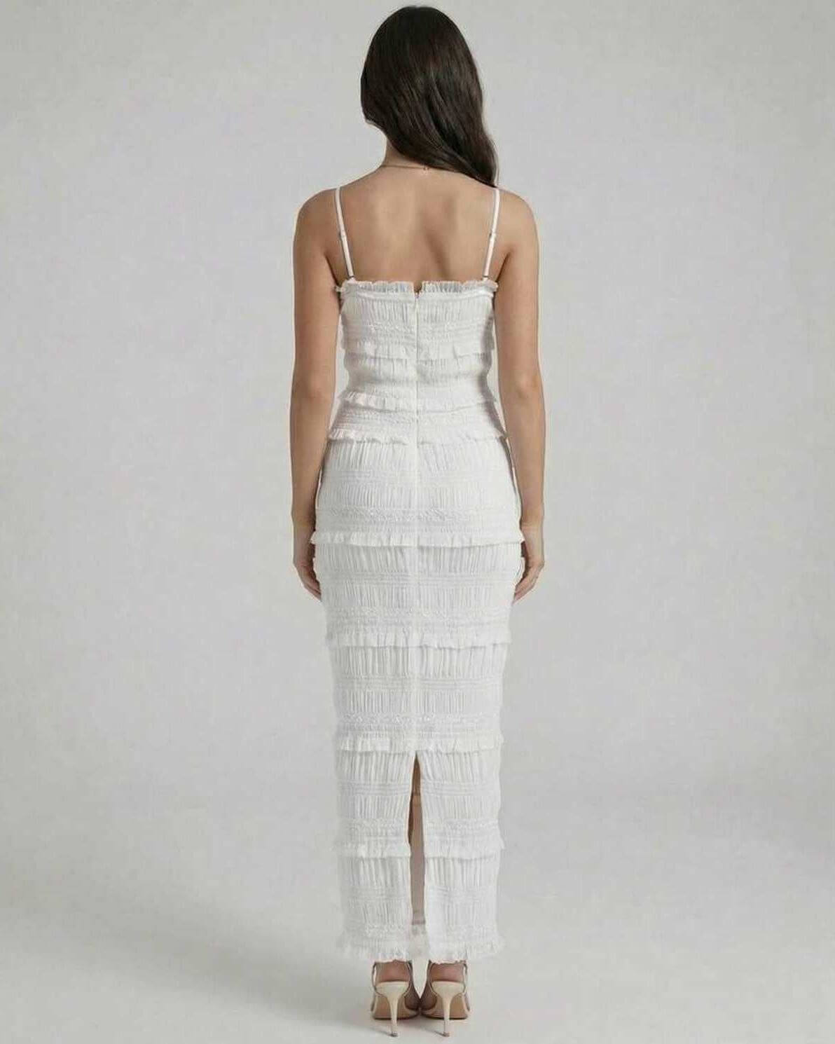 Luna Maxi Dress by Lauven, showcasing a sleek sheath silhouette in crisp white from the back.