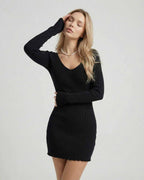 Luna Mini Dress by Lauven - Sleek black ribbed knit long sleeve dress showcasing modern elegance.