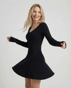 Luna Mini Dress by Lauven - elegant black ribbed knit mini dress with long sleeves, perfect for modern style.