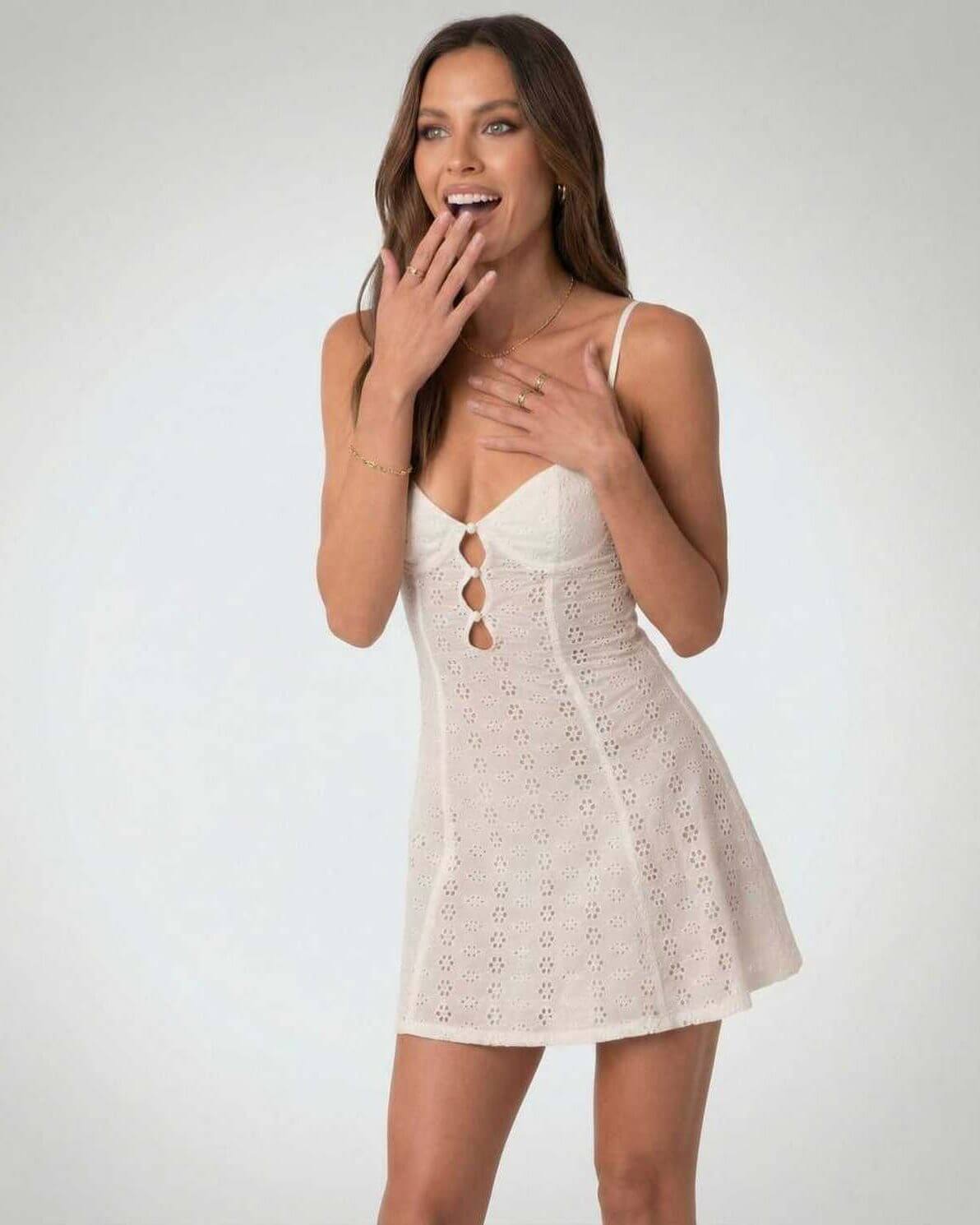Lauven Luna Mini Dress - Elegant A-Line Spaghetti Strap Dress with Hollow Out Detail in white.