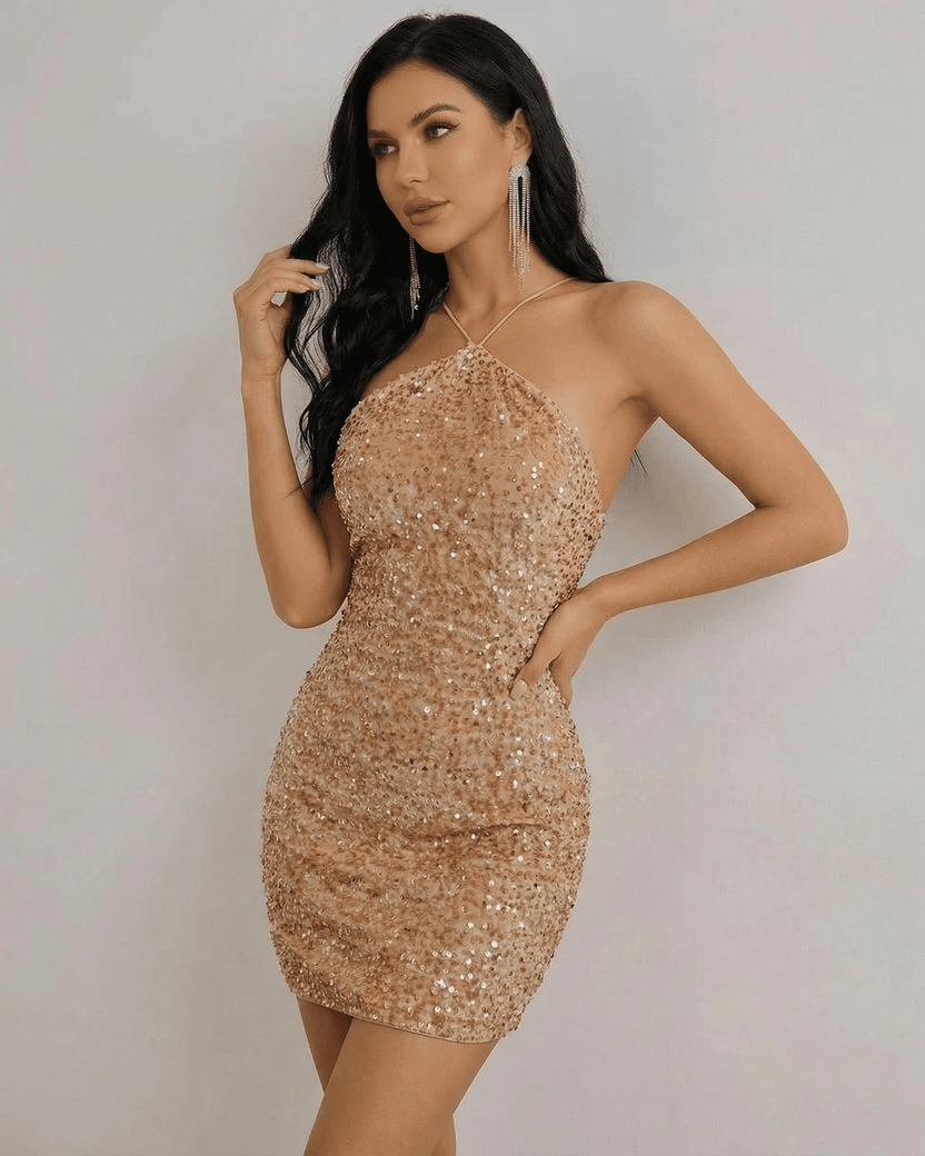 Luna Mini Dress by Lauven in shimmering gold sequin, featuring a halter neck design and structured silhouette.
